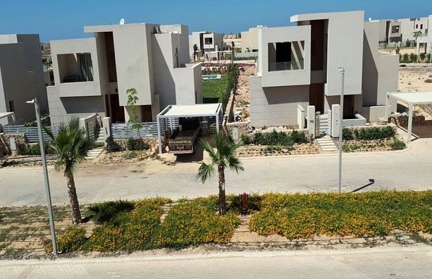 Hacienda Bay villas with palm trees